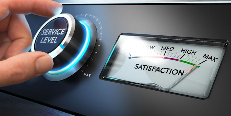 hand turning a service level knob up to the maximum with a dial where it is written the word satisfaction. concept image for illustration of key performance indicator, kpi or customer loyalty.