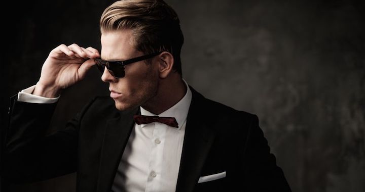 Handsome man in tuxedo with sunglasses