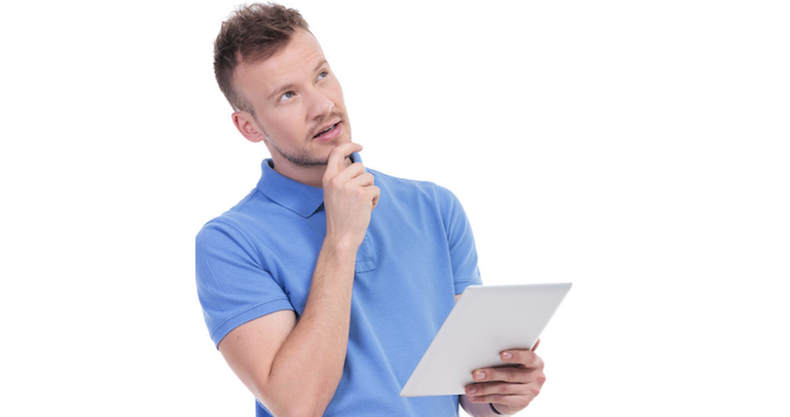 man with ipad making decision
