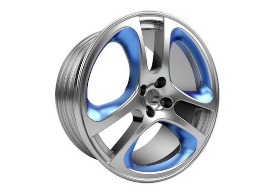 Silver alloy wheel with blue accents.